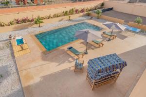 Bazén v ubytování Le Palais de l Atlas luxury villa Marrakech nebo v jeho okolí