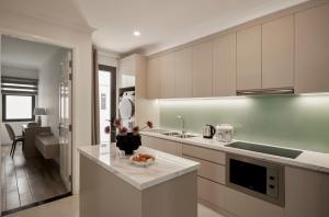 Eldhús eða eldhúskrókur á Hoang Dung Hotel and Apartment by THC Group