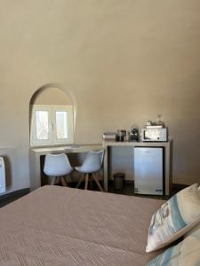 Letto o letti in una camera di Nausicaa Guesthouse