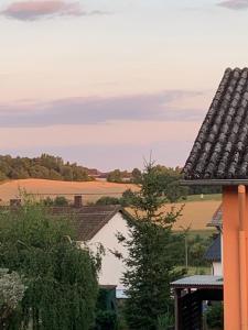 a view of fields from the roof of a house at Ferienwohnung am Feld Winterbach in Sankt Wendel