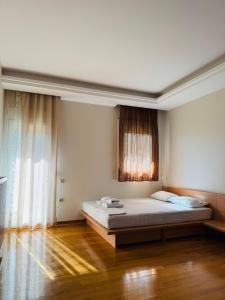 Postel nebo postele na pokoji v ubytování Villa in Elassona-Βίλα στην Ελασσόνα