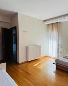 Postel nebo postele na pokoji v ubytování Villa in Elassona-Βίλα στην Ελασσόνα