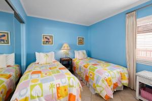 Ένα ή περισσότερα κρεβάτια σε δωμάτιο στο Shipwatch #204