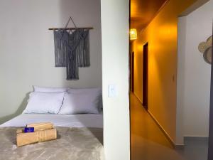 Postel nebo postele na pokoji v ubytování Pousada Quartzo