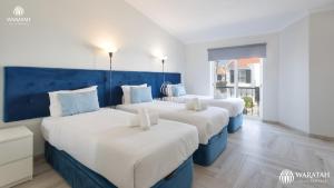Ένα ή περισσότερα κρεβάτια σε δωμάτιο στο Apartamento Fairway