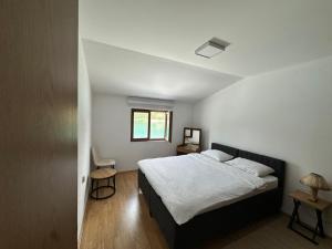 Postel nebo postele na pokoji v ubytování AB Apartmani Radešine