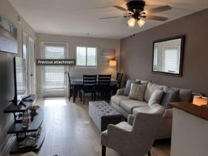 a living room with a couch and a table at Resort Condo for 6 with Tons of Amenities Near Beach in Hilton Head Island