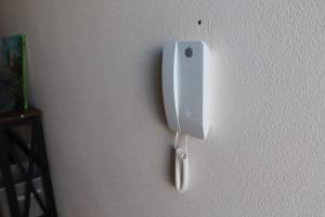 aintendo wii controller is hanging on a wall at Fantastic apartment with pool access in Pataias +92 photos