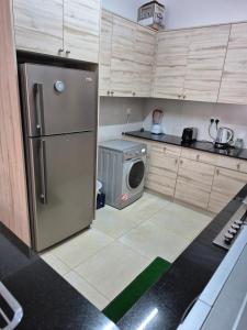 Η κουζίνα ή μικρή κουζίνα στο Aramis Apartments Deluxe Retreat at the Centre of Westlands with Pool & Functionional Gym