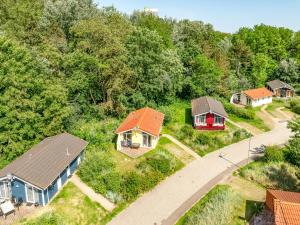 an overhead view of houses in a forest at Pulverhorn - Dorf 4 Ferienhaus 3 in Priwall