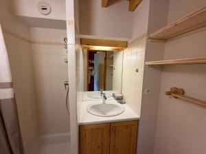 a bathroom with a sink and a shower at Les Saisies Appartement 3 Pièces 8 Pers. avec 2 SDB et Garage - FR-1-293-275 in Hauteluce