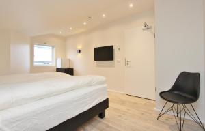 TV a/nebo společenská místnost v ubytování Lava Apartments & Rooms