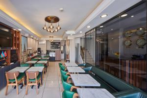 a row of tables and chairs in a restaurant at Pera Life in Istanbul