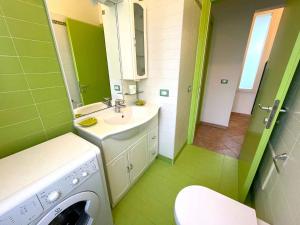 Ένα μπάνιο στο Apartment in Bibione 54648