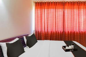 Фотография из галереи Capital O Varca Holiday Suites в Варке
