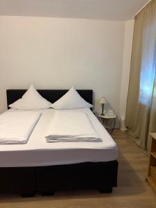 Giường trong phòng chung tại Hotel Ochsen