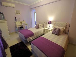 Ένα ή περισσότερα κρεβάτια σε δωμάτιο στο Villa Sesmarias Lux - Luxury Villa With Private Swimming Pool, Sea-Views And Ac +9 φωτογραφίες