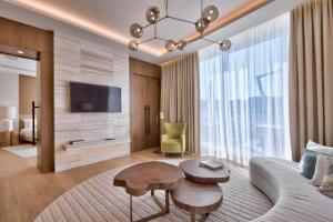 Televiisor ja/või meelelahutuskeskus majutusasutuses Radisson Blu Resort & Spa, Malta Golden Sands