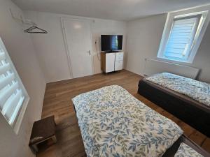 Ένα ή περισσότερα κρεβάτια σε δωμάτιο στο Apartament by B