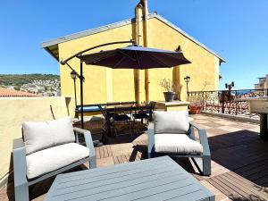 Balkón nebo terasa v ubytování Port 1BR Flat with Terrace