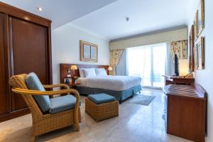 Łóżko lub łóżka w pokoju w obiekcie Swiss Inn Resort Hurghada