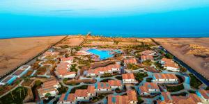 an aerial view of a resort on the beach at Ecotel Dahab Bay View Resort in Dahab