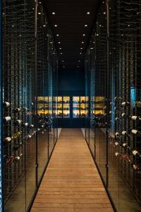 a wine cellar with many bottles of wine at Voyage Belek Golf & Spa Hotel in Belek