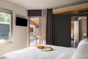 Posteľ alebo postele v izbe v ubytovaní Blue Dolphin Hotel