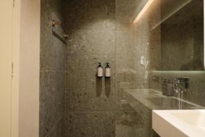 Koupelna v ubytování Hotel Natica