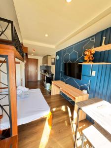 a room with a bunk bed and a kitchen at the 5th floor in Baguio