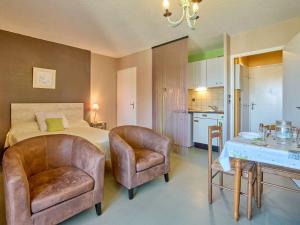 Kuchyň nebo kuchyňský kout v ubytování Studio 2 pers. à Barbotan avec balcon et Wifi gratuit - FR-1-841-1