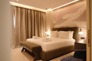 Postel nebo postele na pokoji v ubytování Hotel Natica