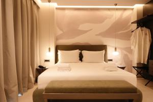 Postel nebo postele na pokoji v ubytování Hotel Natica