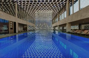 Bazén v ubytování Maxx Royal Kemer Resort nebo v jeho okolí