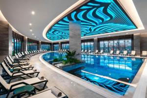 Bazén v ubytování Calyptus Kirman Premium - Ultra All Inclusive nebo v jeho okolí