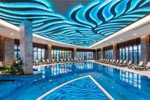 Bazén v ubytování Calyptus Kirman Premium - Ultra All Inclusive nebo v jeho okolí
