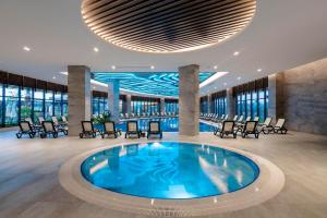 Bazén v ubytování Calyptus Kirman Premium - Ultra All Inclusive nebo v jeho okolí