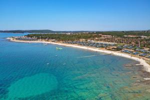 an aerial view of a beach with a group of buildings at Arena Grand Kazela Camping Homes in Medulin