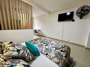 Fotografie z fotogalerie ubytování Ébano Apartasuites v destinaci Estación El Salto