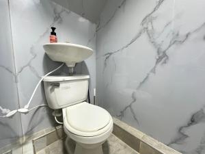 Fotografie z fotogalerie ubytování Ébano Apartasuites v destinaci Estación El Salto