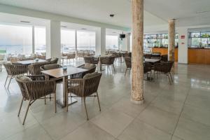 Ein Restaurant oder anderes Speiselokal in der Unterkunft Hotel Amic Horizonte 
