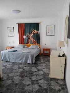 Postel nebo postele na pokoji v ubytování Gota de Mar + 37 fotografií