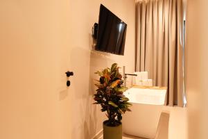 TV a/nebo společenská místnost v ubytování Hotel Natica