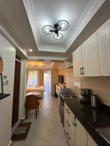 Η κουζίνα ή μικρή κουζίνα στο Pamoja Cozy Stays