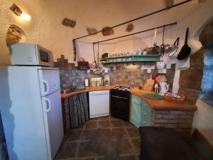 Kuchyň nebo kuchyňský kout v ubytování Holiday home in Dobrec 15114