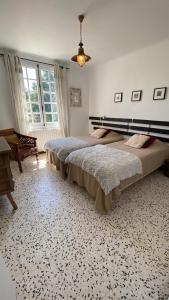 Postel nebo postele na pokoji v ubytování Vacances au cœur de la Provence, en famille ou entre amis