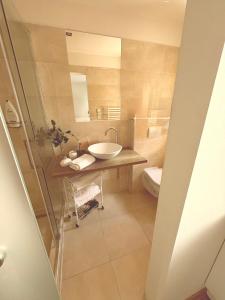 Kúpeľňa v ubytovaní Trio Apartments + 29 fotografií