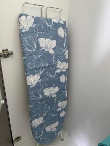a towel rack with a blue and white flower pattern at Cameron Golden Hills Near Night Market CH1 in Brinchang