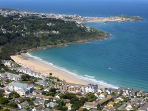 an aerial view of a beach with buildings and houses at The Cottage in St Ives +1 photo