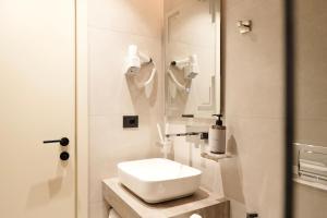 Koupelna v ubytování Hotel Natica